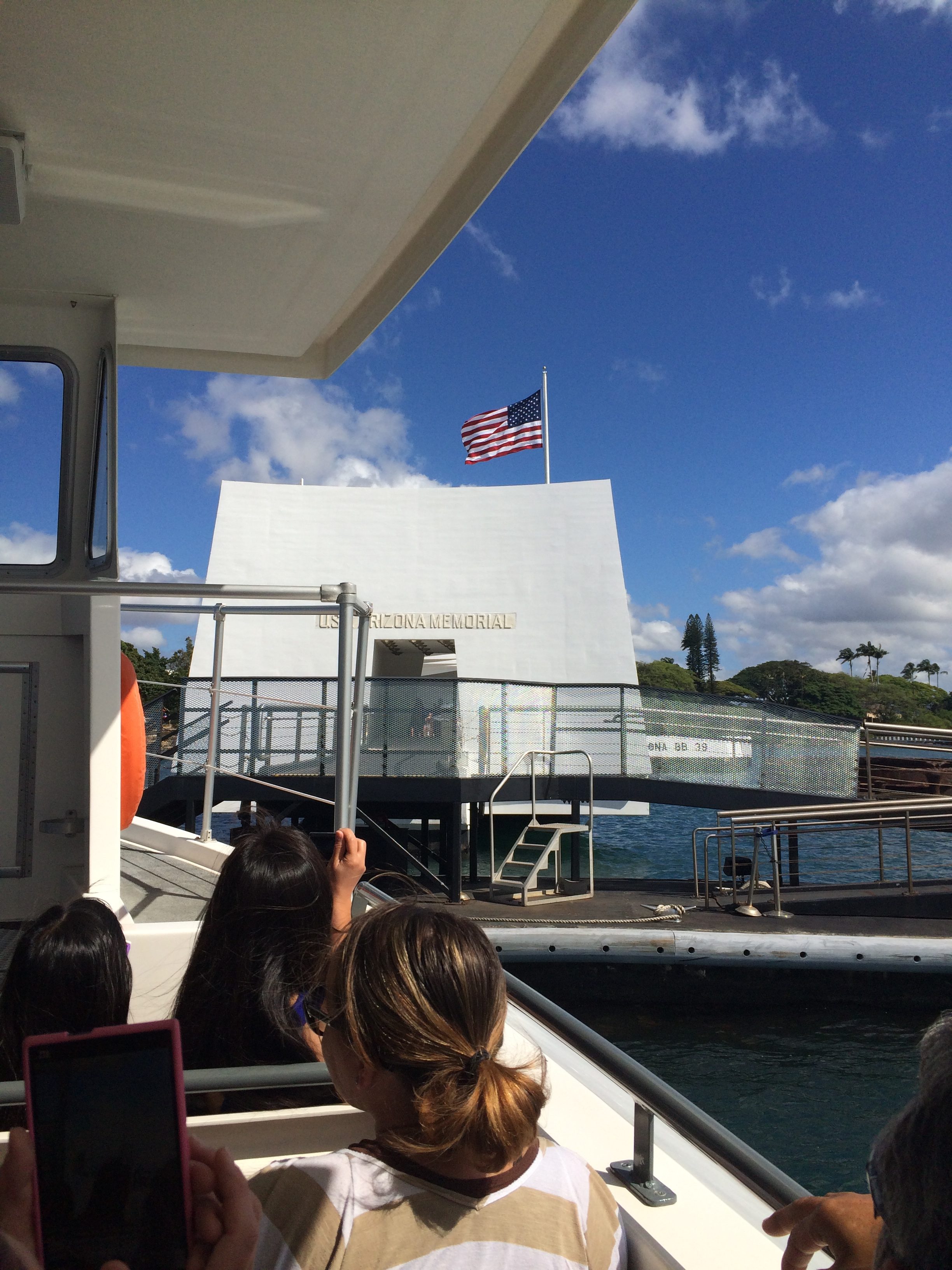 Arriving by boat at the USS Arizona Memorial
